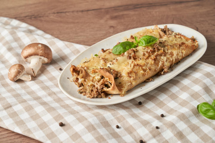 Überbackene Palatschinken mit Kräuterseitling-Faschiertem