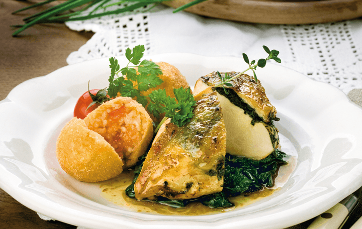 Bio-Hendl mit Kräutern und gebackenem Paradeiserrisotto