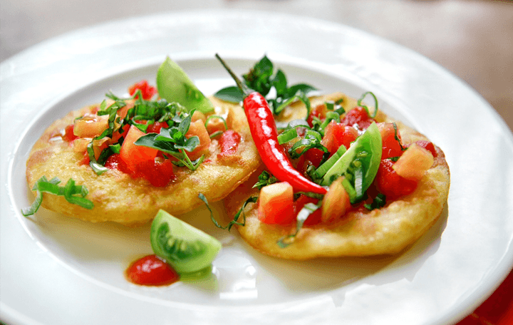 Erdäpfel-Paradeiserlangos mit Oregano
